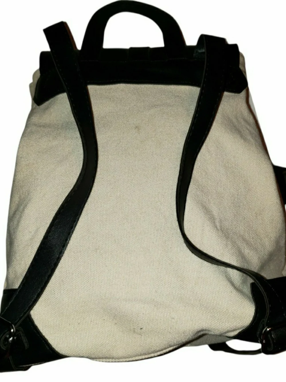 Deux Lux canvas demi backpack with a distinctive structured black vegan leather.